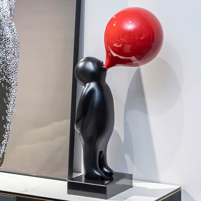 Tượng cậu bé thổi bóng decor