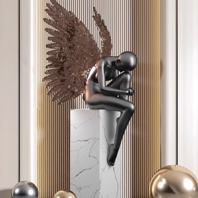 Tượng thiên thần ôm gối 